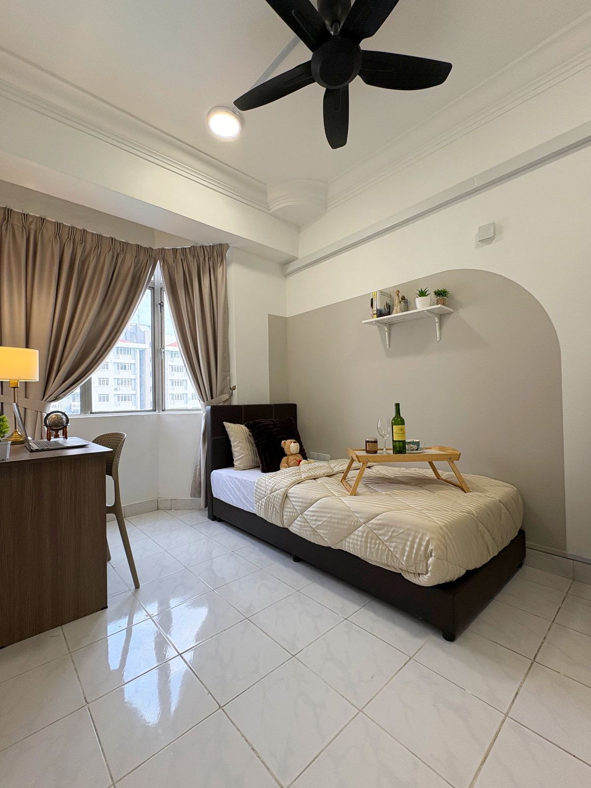 Single bedroom with a window, study desk, and tiled floor