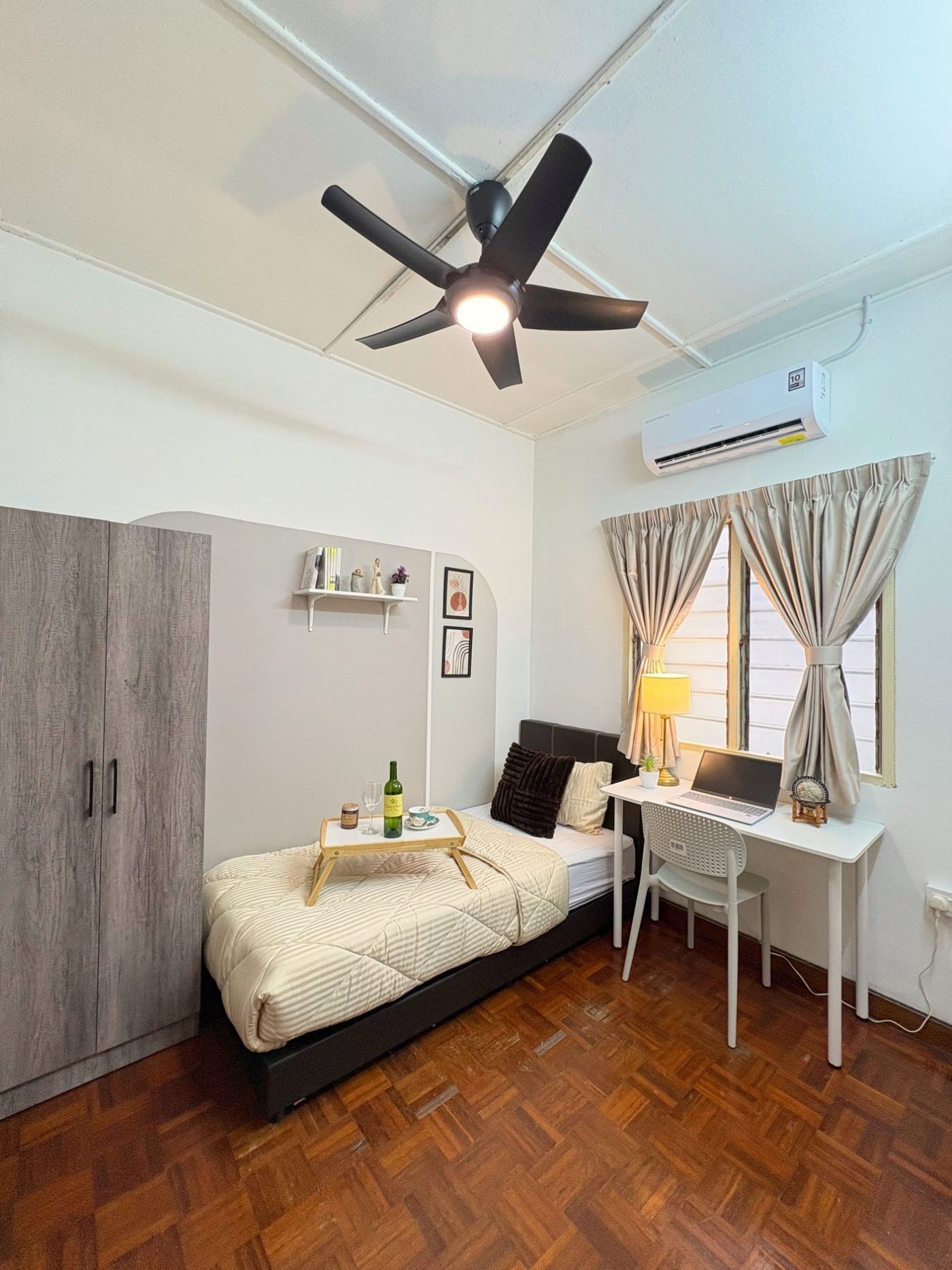 Single Room: a furnished single bed with a wardrobe, desk, and window
